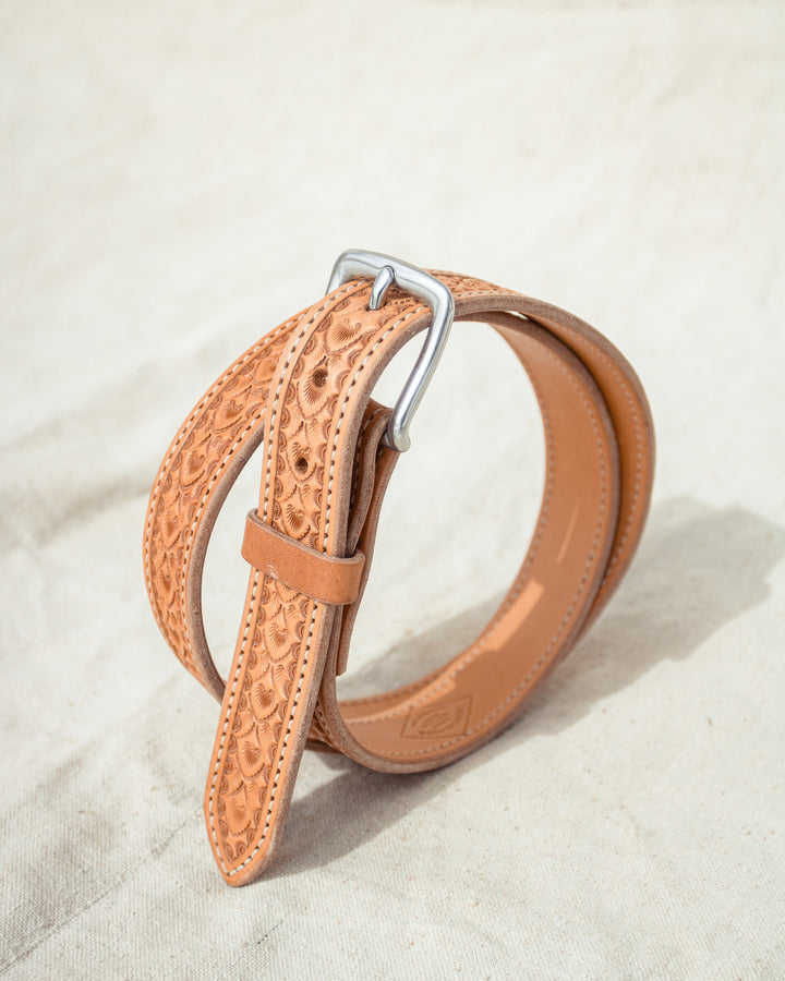 Handcrafted leather goods, premium knives with hand-forged steel blades, classic Western-style apparel, authentic home decor, and unique handmade jewelry by Ranchlands Mercantile, inspired by ranch life in Wyoming, USA.